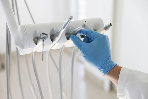 Professional Tooth Extraction technician working in Crossett, AR